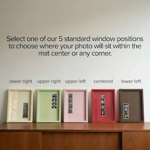 Five customizable mat window positions shown for a personalized photobooth strip frame, including centered and corner placement options for creating a unique photo display. Customers can select the position that best complements their photo booth strip and interior style. Custom handmade picture frame perfect for wedding memories, engagement photos, gallery wall decor, modern home decor, personalized wedding gifts, anniversary gifts, Christmas presents, birthdays, and special photo gifts.