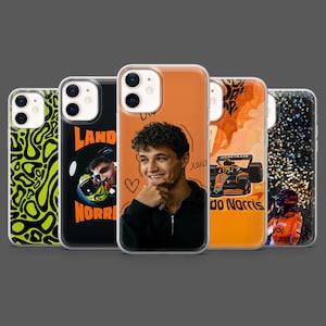 May include: A collection of five phone cases with various designs. One case features a neon green and black pattern, while others showcase images of a race car driver. The cases are in different colors, including black and orange, and have a glossy finish.