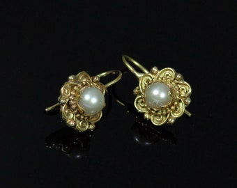 Boucles d'oreilles en or 18 carats avec perles