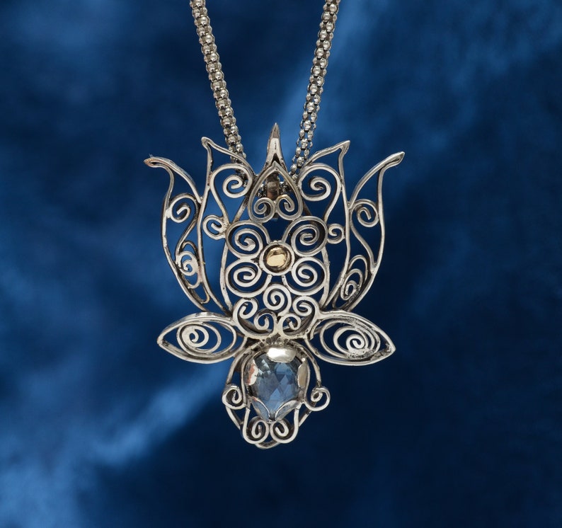 Aquamarine lotus with a heart of gold image 1