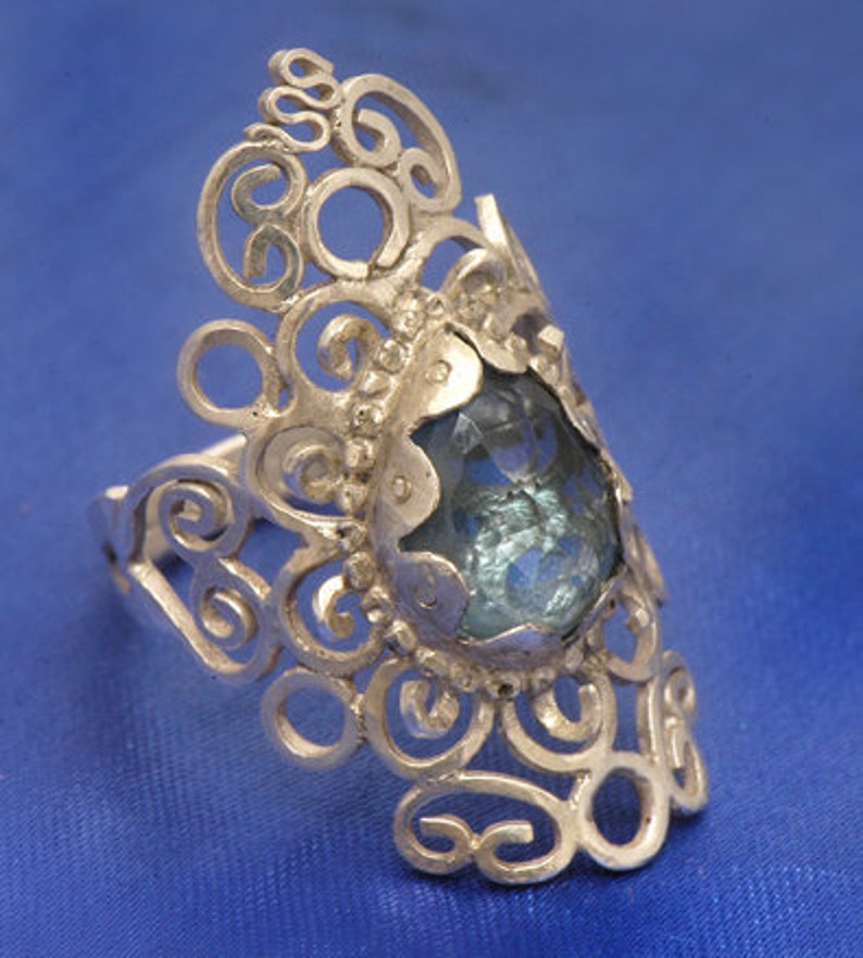 Silver ring with Dark blue Topaz image 2