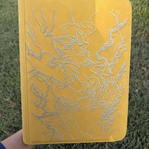 jolteon card binder Day 251 of my Pokemon Series Eevee's electric evolution. The shortest and lightest of all eevee evolutions making Jolteon as fast as lightning. Jolteon is temperamental depending on it's electrical charge panoramic cards included Custom Pokemon Laser Engraved 9
