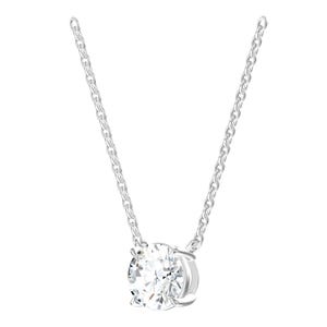 May include: A silver-toned necklace featuring a single round, clear, faceted stone set in a four-prong metal setting. The pendant is suspended from a delicate, thin silver-toned chain with small, uniform oval links that extend upward from the stone.