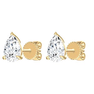 May include: A pair of stud earrings featuring pear-shaped clear stones set in yellow gold. Each earring has a three-prong setting and a round, textured screw-back closure. The design highlights the faceted cut of the stones and the metallic finish.