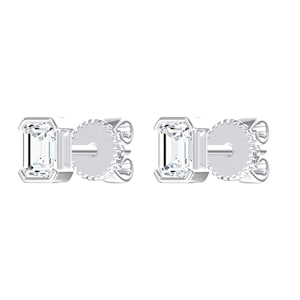 May include: A pair of silver-toned stud earrings featuring emerald-cut clear stones set in a rectangular metal frame. Each earring includes a post back with a circular, textured backing mechanism for secure attachment to the earlobe.