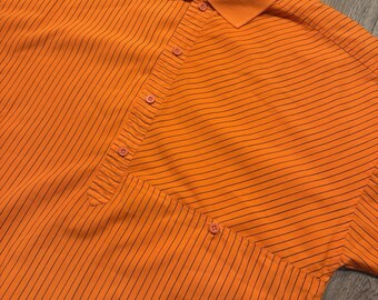 Camisa Piermonte de manga larga con botones, talla M, estilo vintage de los años 80, color naranja y negro.