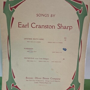 May include: Vintage sheet music cover featuring the title "SONGS BY Earl Cranston Sharp." The cover has a decorative green and red border. Titles of songs include "Japanese Death Song" and "Yesteryear." Published by Oliver Ditson Company.