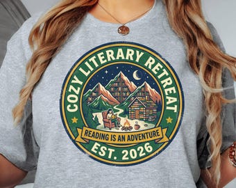 Cozy Literary Retreat T-Shirt | Reading Is An Adventure Vintage Badge Tee