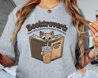 Booktrovert Reading Raccoon T-Shirt | Book Lover Tee, Coffee & Fiction Design