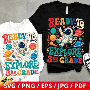 May include: A white t-shirt and a black t-shirt, each featuring a colorful graphic of an astronaut floating in space surrounded by planets and stars, with the text "READY TO EXPLORE 3RD GRADE" in a bold, retro-style font across the front.