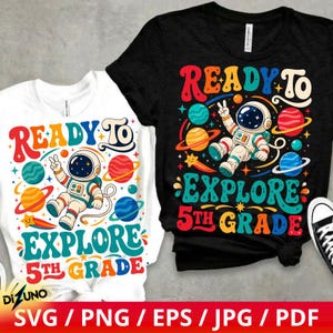 May include: A white t-shirt and a black t-shirt, each featuring a colorful graphic of an astronaut floating among planets with the text "READY TO EXPLORE 5TH GRADE" in a retro, multi-colored font style with stars and shooting star accents.