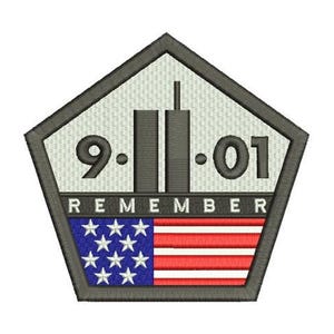 May include: Embroidered patch in a pentagon shape with a grey border. The design features the numbers "9-11-01" with twin towers, the word "REMEMBER", and an American flag. The patch is a patriotic tribute.