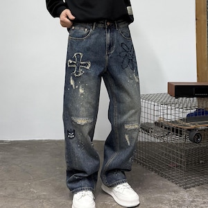 Patchwork Denim Jeans | Ripped Distressed Straight Design | Daily Wear | Y2K Streetwear Style

Patchwork denim jeans with ripped distressed details and straight leg fit, styled for streetwear outfits, casual looks, and everyday fashion.