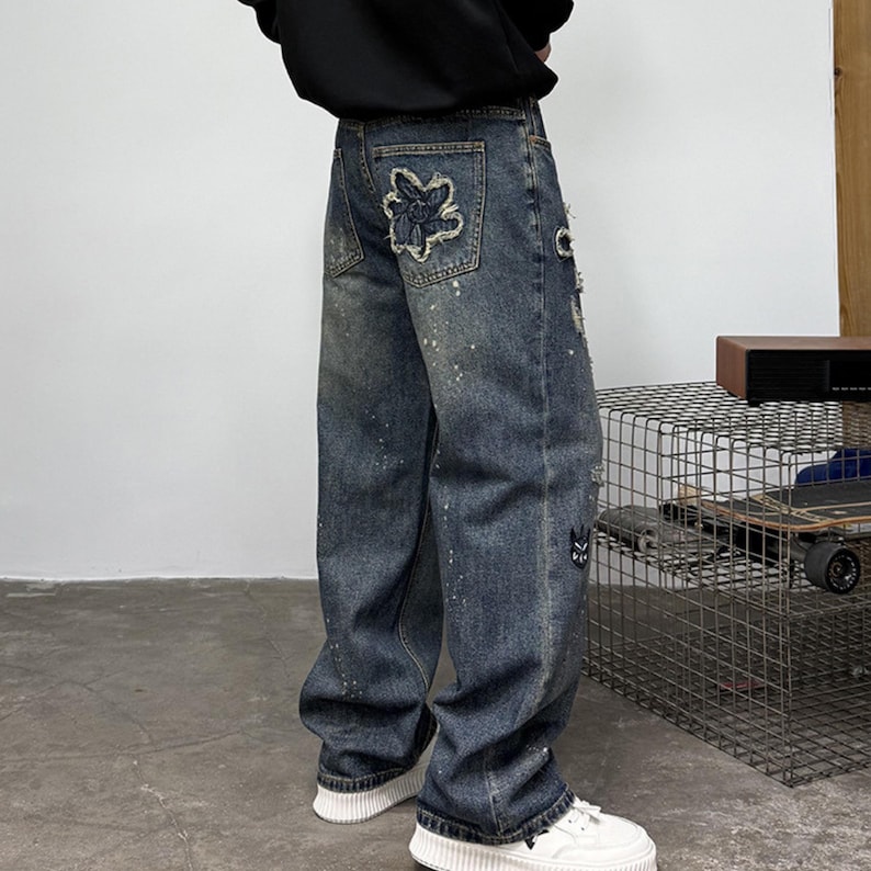 Patchwork Denim Jeans | Ripped Distressed Straight Design | Daily Wear | Y2K Streetwear Style

Patchwork denim jeans with ripped distressed details and straight leg fit, styled for streetwear outfits, casual looks, and everyday fashion.