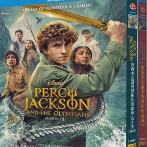 May include: A Blu-ray disc case for "Percy Jackson and the Olympians: The Sea of Monsters." The cover shows a young man with a golden sword, and other characters. The title and season number are visible. The case also has text in another language.