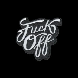 May include: Embroidered patch with the words "Fuck Off" in white script lettering on a black background. The patch has a black border and a cursive font.