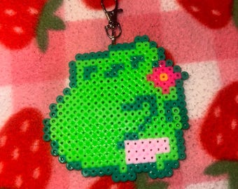 chaveiro de sapo com pênis feito em contas Perler