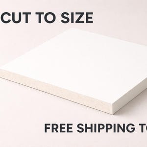 May include: A white, square, cut-to-size board with a light-colored edge. The board is set against a light background. The text "CUT TO SIZE" is at the top.