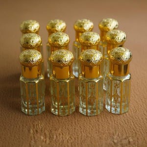 Paquete de 12 frascos de perfume de vidrio transparente, niebla dorada ligera, 11 ml