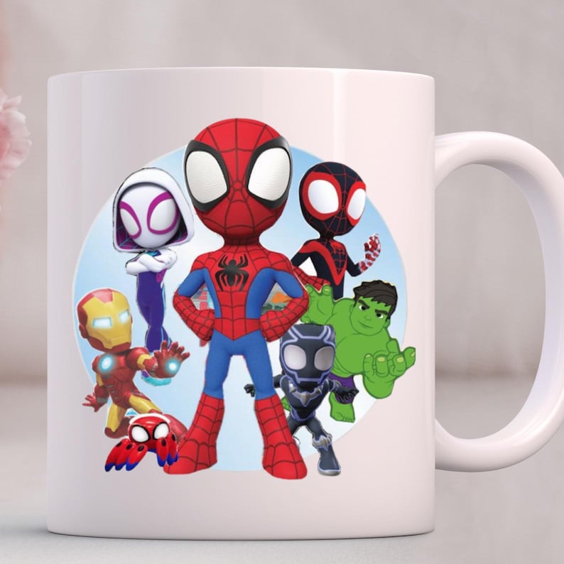 May include: A set of three ceramic mugs with a speckled, matte finish. The mugs are in cream, light grey, and dark grey. Each mug has a simple, minimalist design, ideal for coffee or tea.