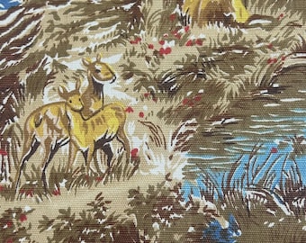 May include: A woven fabric featuring a repeating pattern of deer in a forest setting. The design includes brown, tan, and yellow deer standing among green foliage, brown trees, and patches of blue water, accented by small red floral details.