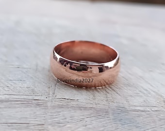 Anello a fascia in rame massiccio fatto a mano: un anello di anniversario di grande effetto.