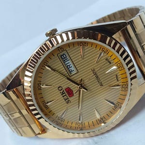 Vintage Seiko 5 Automatic Watch: Gold Dial, Japan Made, Day/Date image 5