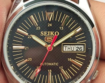 Vintage Seiko 5 automatisch polshorloge, zwarte wijzerplaat, gemaakt in Japan