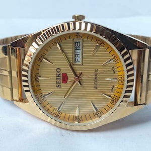 Vintage Seiko 5 Automatic Watch: Gold Dial, Japan Made, Day/Date image 4