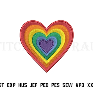 May include: An embroidered heart patch featuring concentric layers of red, orange, yellow, green, blue, and purple thread. Below the heart, the text reads DST, EXP, HUS, JEF, PEC, PES, SEW, VP3, and XXX in a bold, black, sans-serif font.