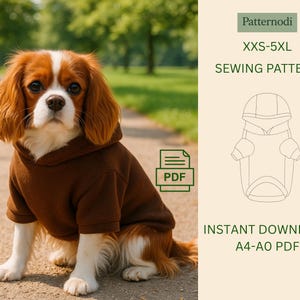 May include: A Cavalier King Charles Spaniel dog wearing a brown hoodie. The image includes text that reads "Patternodi XXS-5XL SEWING PATTERN" and "INSTANT DOWNLOAD A4-A0 PDF". A PDF icon is also present.