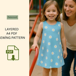 Smiling girl in blue daisy kids a line dress at playground with parent, layered A4 PDF sewing pattern graphic