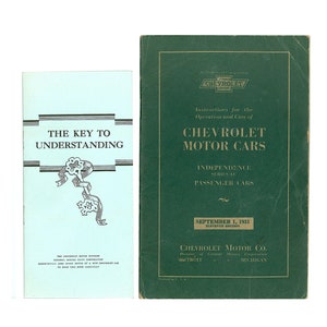 May include: Two vintage green and blue paperbacks with the title "The Key to Understanding" and "Instructions for the Operation and Care of Chevrolet Motor Cars, Independence Series "A" Passenger Cars".