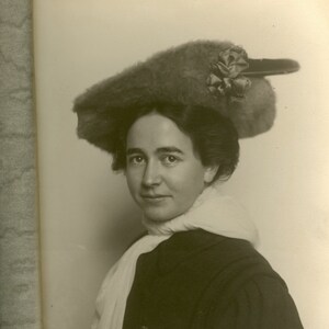 Antique Edwardian Era Photograph: Young Woman with Scarf and Feathered Fur Hat. Winter Fashion