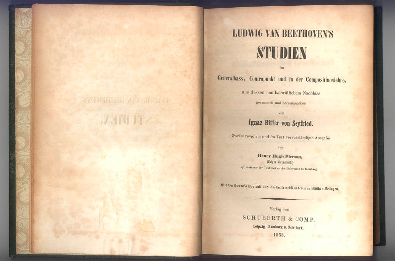 May include: An open book with the title "LUDWIG VAN BEETHOVEN'S STUDIEN" in large, bold letters. The book's pages are aged with text in German. The cover is dark green with a decorative border.