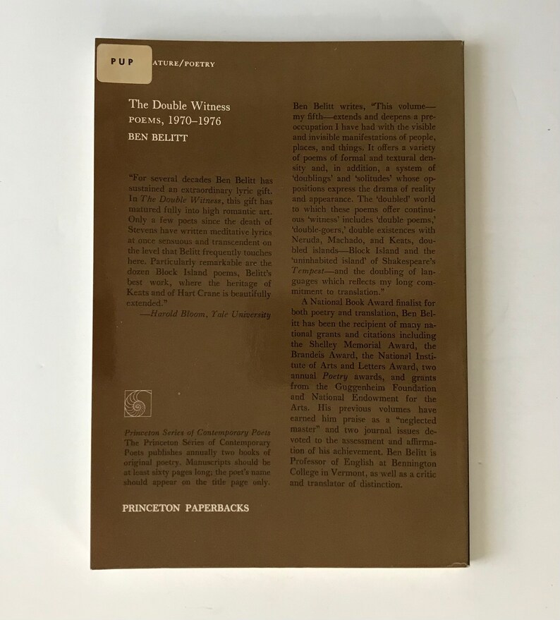 May include: A brown book cover with the title "The Double Witness" by Ben Belitt. The book cover features a quote from Harold Bloom, Yale University, praising the author's work.