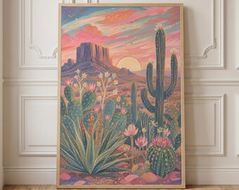May include: A framed art print depicting a desert landscape at sunset. The artwork features various cacti, including saguaros and prickly pears, with a mountain range in the background. The sky is painted with vibrant pinks, oranges, and blues.