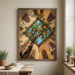 May include: A framed painting depicts an orange tree laden with fruit, set against a backdrop of ornate architecture. The artwork captures a low-angle perspective, showcasing the tree's branches reaching towards a patch of blue sky.