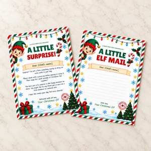 May include: Two rectangular Christmas stationery cards featuring a festive border of red and green stripes, colorful string lights, snowflakes, and holly. One card reads A LITTLE SURPRISE and the other A LITTLE ELF MAIL, both with an elf illustration.