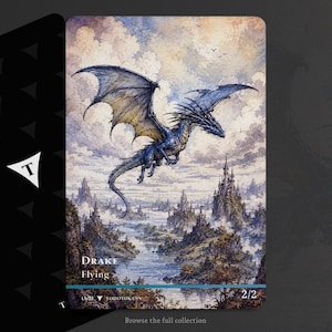 May include: A rectangular game card featuring a blue dragon in flight over a landscape with rocky spires and a castle. The text on the card reads Drake, Flying, 2/2, and Judotokens. The card has a blue horizontal bar at the bottom and a black back.