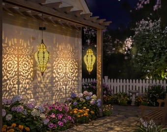 Moroccan-style double-sided hanging solar lantern outdoor light, waterproof plastic with gold-colored decoration.