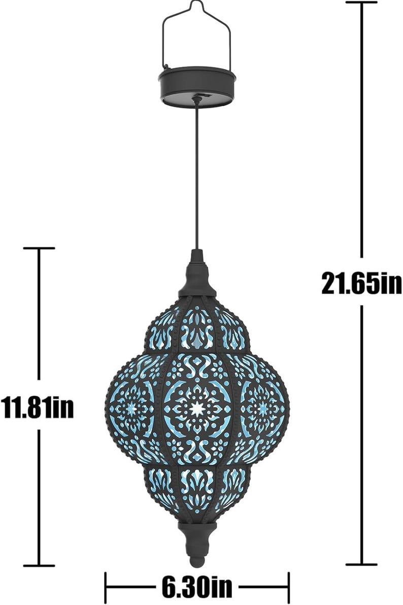 May include: Black metal hanging lantern with intricate cut-out patterns. The lantern is 21.65 inches tall and 6.30 inches wide, with a decorative design and a handle for hanging. The interior has a blue glow.