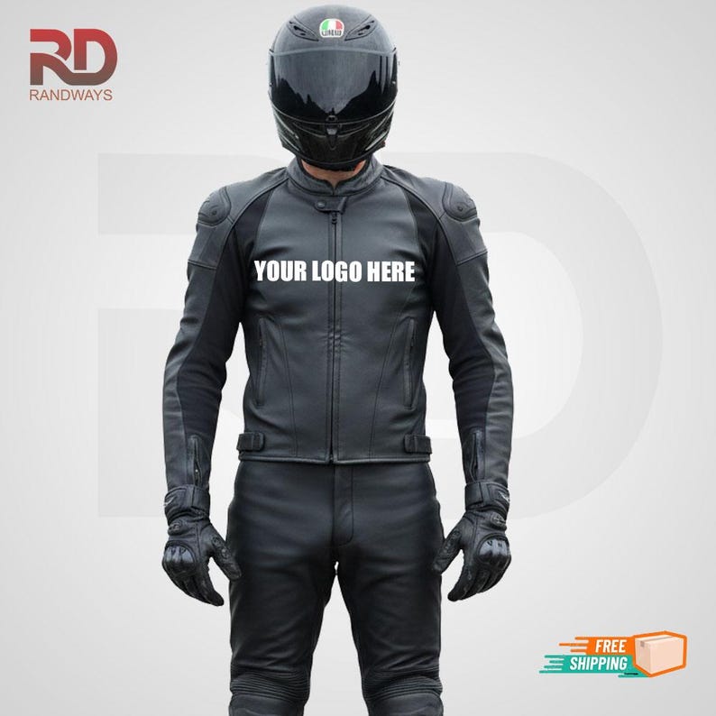 May include: Black leather motorcycle jacket and pants set with the text "YOUR LOGO HERE". The jacket has shoulder padding and a zipper closure. The model is wearing a black helmet and gloves. The image also includes the logo "RD RANDWAYS".