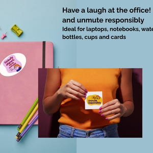 May include: A pink notebook with a sticker that says "Globally aligned, mostly confused" and a person holding a sticker that says "Unmute responsibly". The image also includes pencils and push pins.