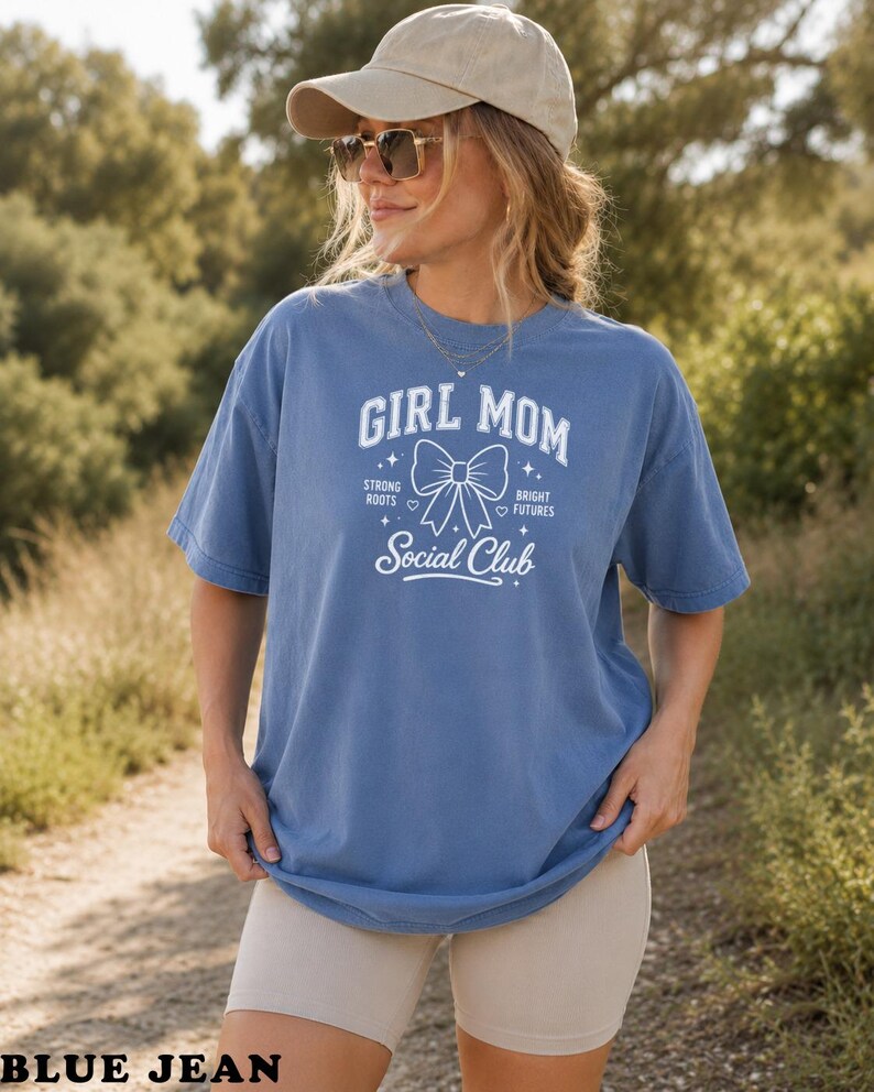 Comfort Colors t-shirt with "Girl Mom Social Club" text and bow graphic.