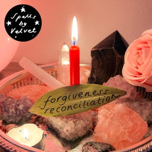 May include: A round tray holds a red taper candle, a white tea light, a bay leaf inscribed with the words forgiveness reconciliation, a pink rose, and various crystals including amethyst, selenite, and obsidian. A black logo reads Spells by Velvet.