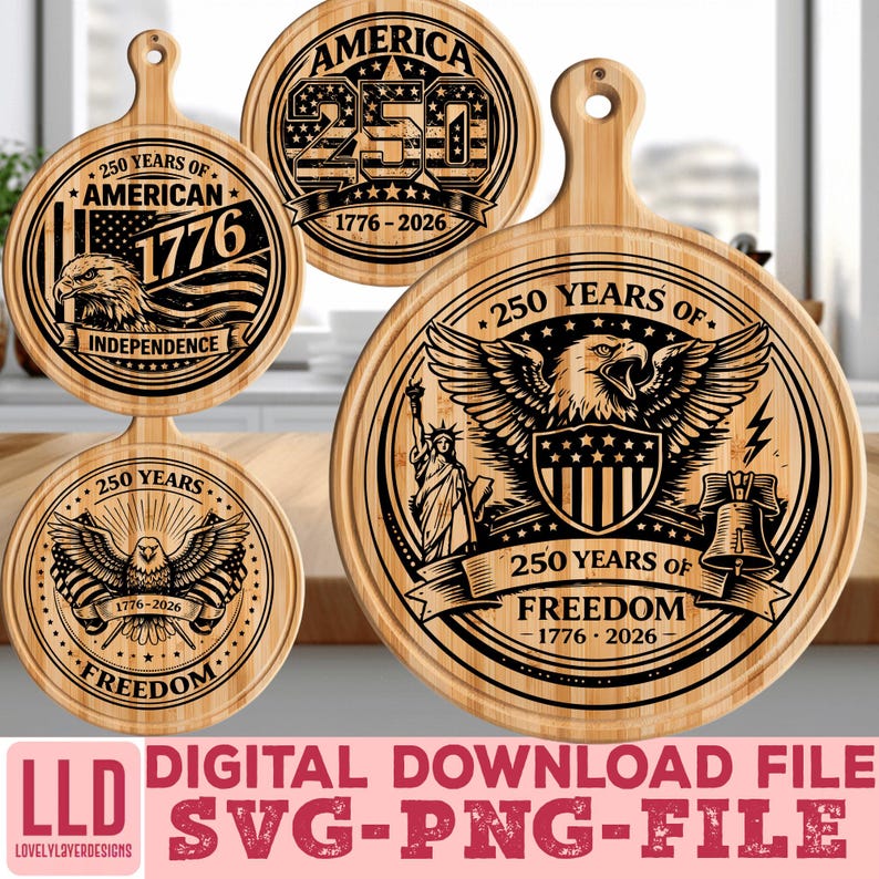 May include: Wooden cutting boards with engraved patriotic designs. The boards feature the text "250 Years of American Independence" and "250 Years of Freedom" with an eagle, the American flag, and the Statue of Liberty. The boards are round with a handle.