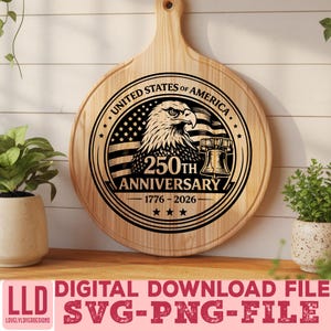 May include: A round wooden cutting board with a handle, featuring a laser-etched design commemorating the 250th anniversary of the United States. The design includes an eagle, the American flag, and the Liberty Bell. The text "UNITED STATES OF AMERICA" and "250TH ANNIVERSARY 1776-2026" are also included.