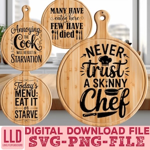 May include: Four round bamboo cutting boards with humorous kitchen-themed quotes in black. The quotes include "Annoying the Cook Will Result in Starvation" and "Never Trust a Skinny Chef".