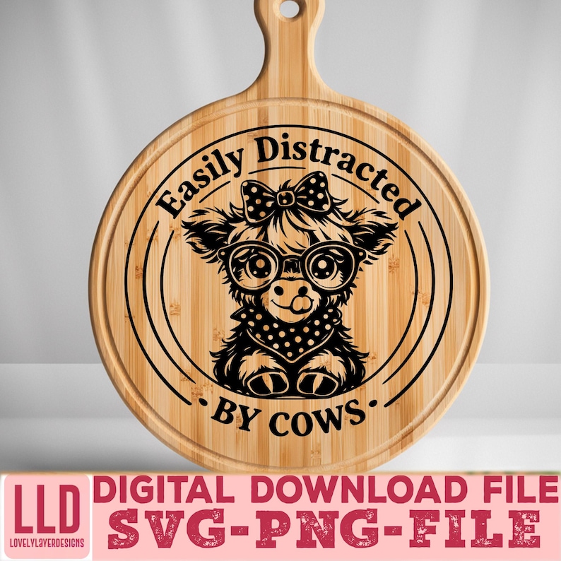 May include: Round wooden cutting board with a handle, featuring a cow graphic wearing glasses and a bow, with the text "Easily Distracted BY COWS." Below is the text "DIGITAL DOWNLOAD FILE SVG-PNG-FILE."